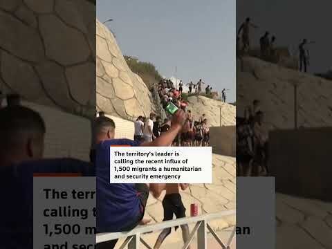 Hundreds of migrants swim to Spain's Ceuta