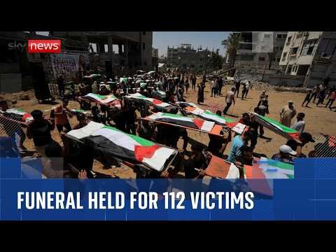 Funeral held for 112 victims buried under rubble of Gaza flats for nearly three years