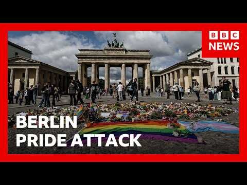 Crowds gather at Brandenburg Gate for vigil after vehicle driven into crowd