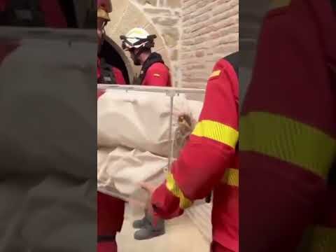 Spain removes remains of kings from monastery as fires rage
