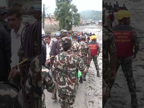 Himalayan flood survivor carried out by digger