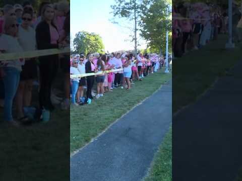 Dozens gather at a silent rally in support of Clancy