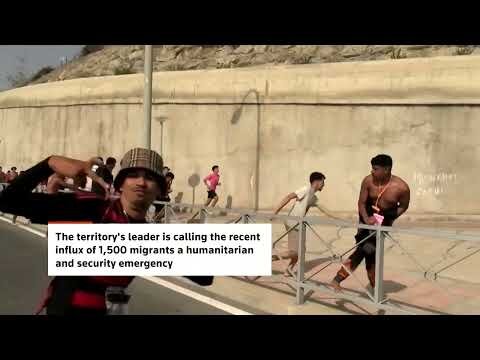 Migrants swim to Spain's Ceuta as city issues emergency