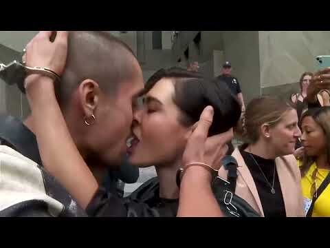 Empire State Building climbers share kiss after court hearing
