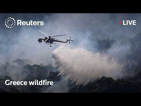 Wildfire smoke rises in Greece