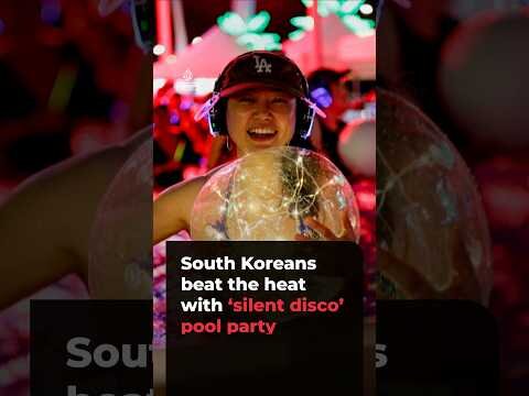 South Koreans beat the heat with ‘silent disco’ pool party