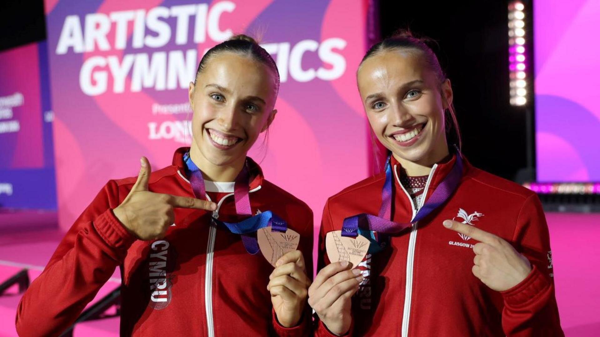 Identical twins win gymnastics medals on same day