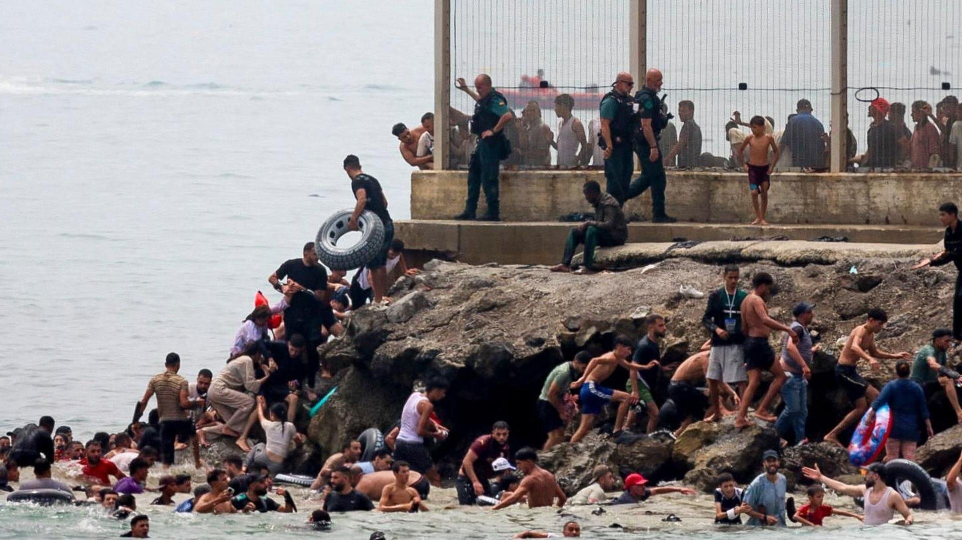 Spain sending troops as thousands enter enclave of Ceuta from Morocco