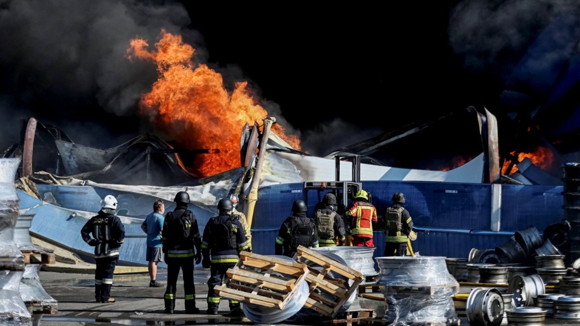 At least 27 dead and hundreds evacuated after strike on Kyiv warehouse