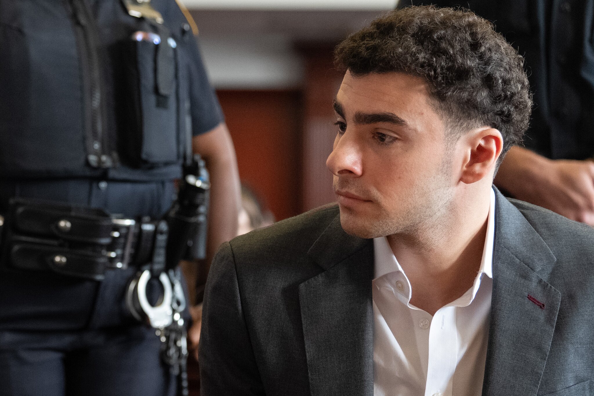 Luigi Mangione's September trial is off as defense tries to get state charges dismissed