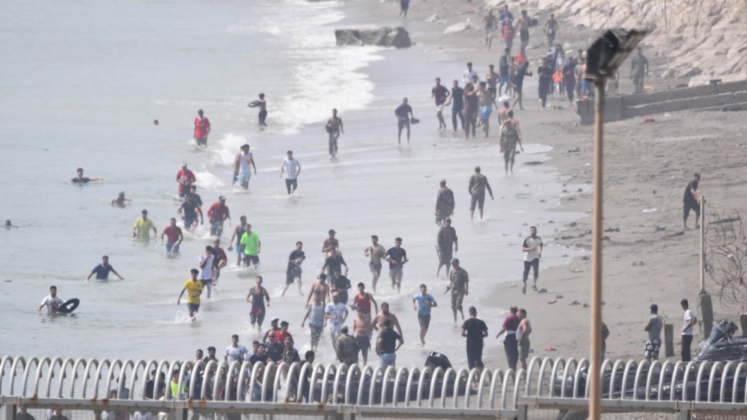 Dozens dead in migrant crisis rush into Spanish enclave