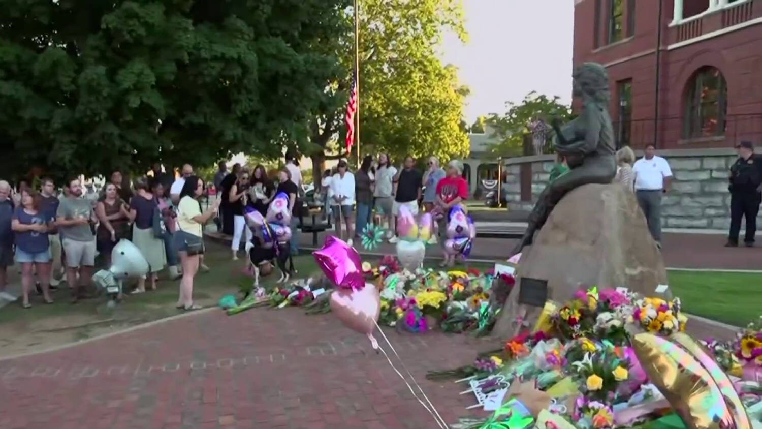Fans gather at Dolly Parton's statue in her hometown
