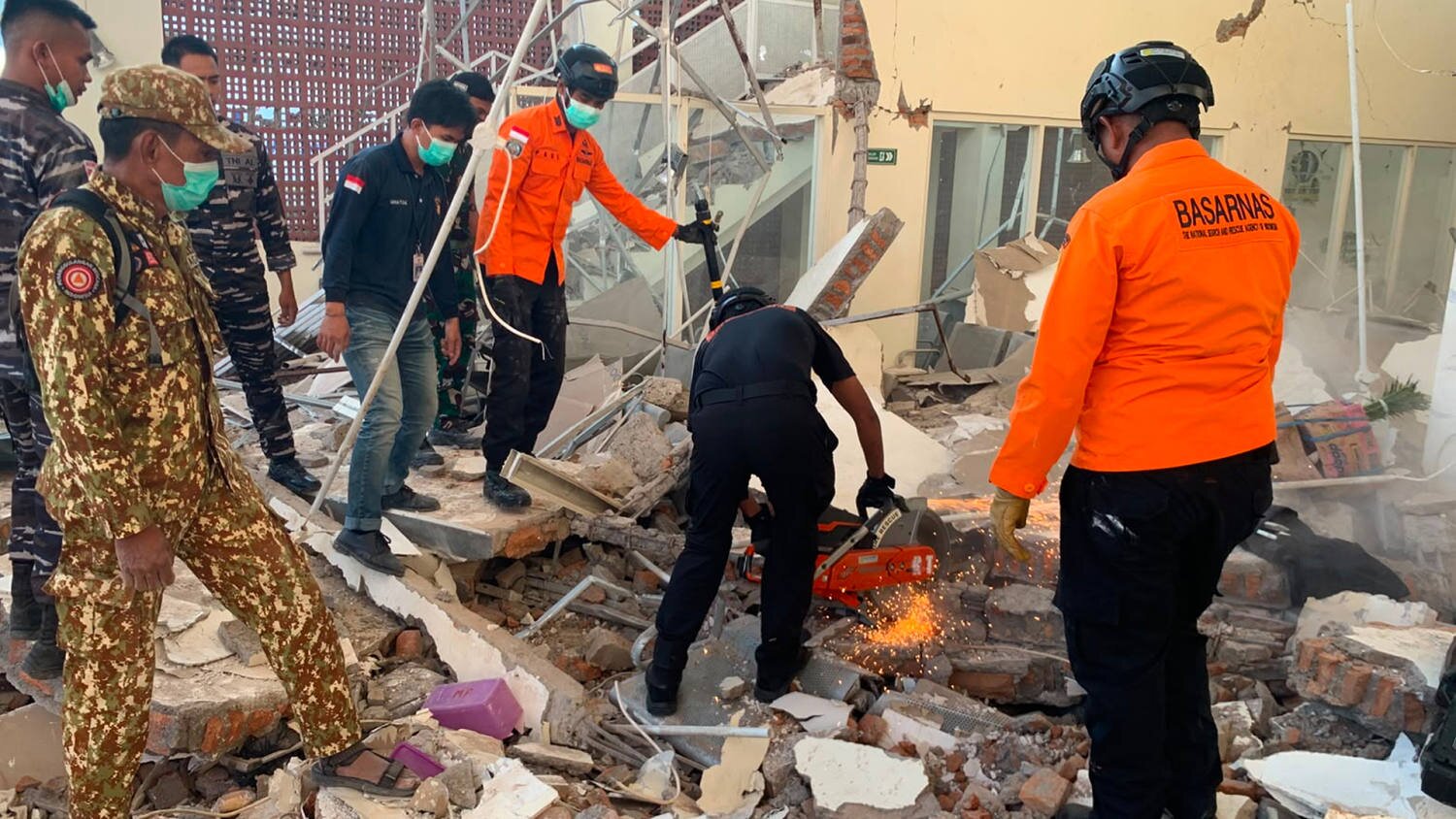 At least two people killed after magnitude-7.7 earthquake strikes near Indonesia