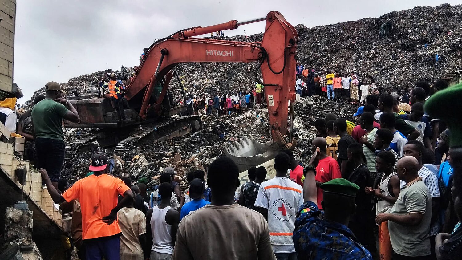 Dozens killed after rain triggers landslide at a landfill in Guinea