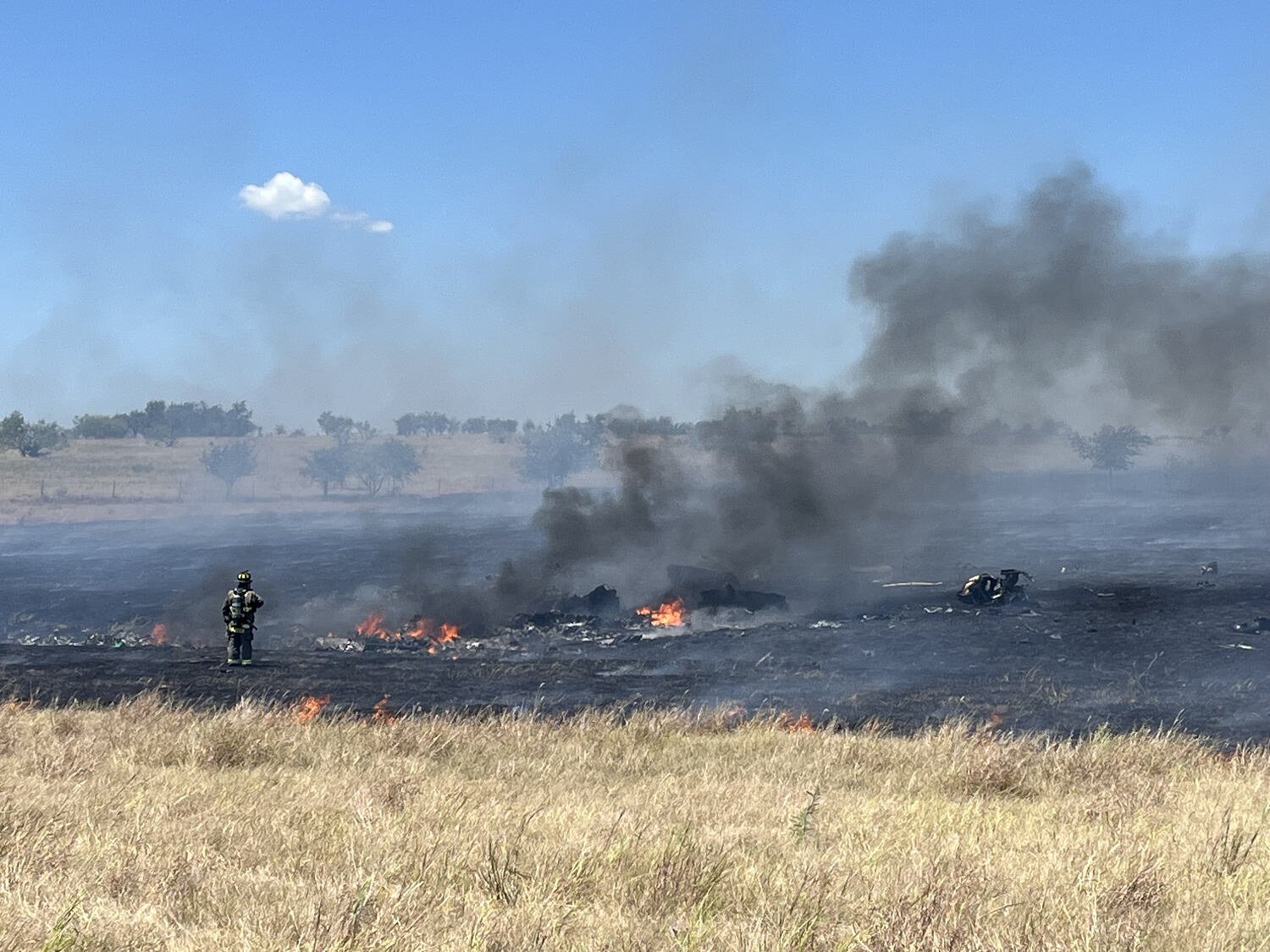 Two people are dead after a military helicopter crashes in Texas, sparking a fire