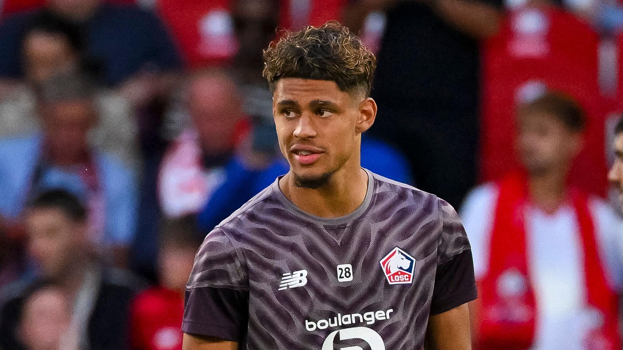 Burnley sign French midfielder Raghouber
