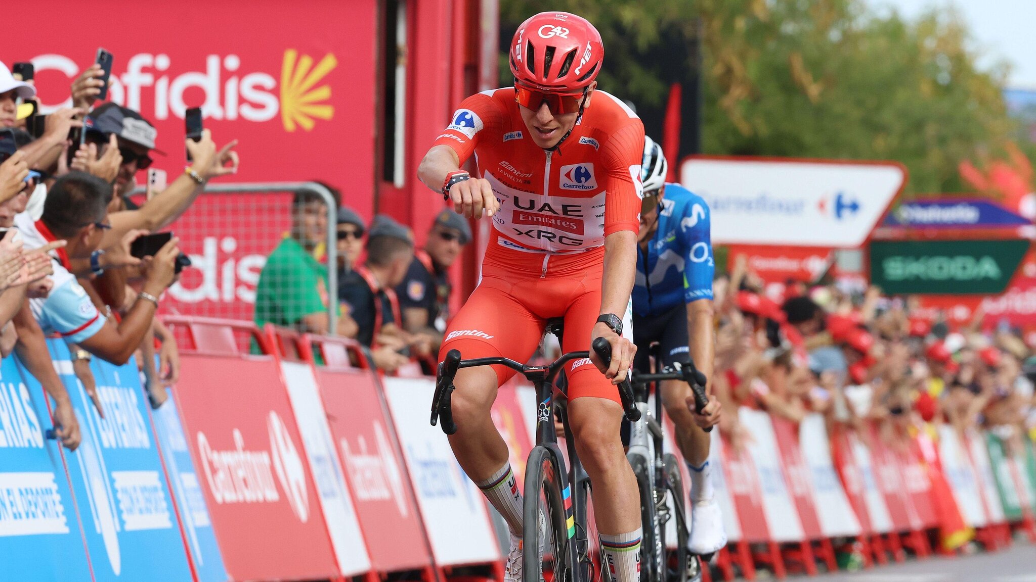 Pogacar fights off Mas challenge to win stage six