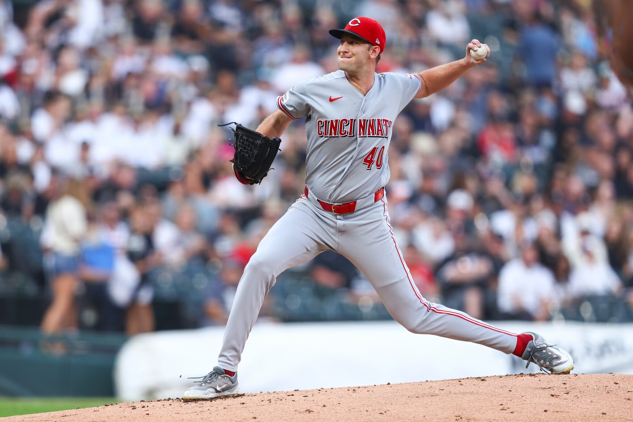 Holy Cow, Reds come back to beat pope-inspired White Sox in extras