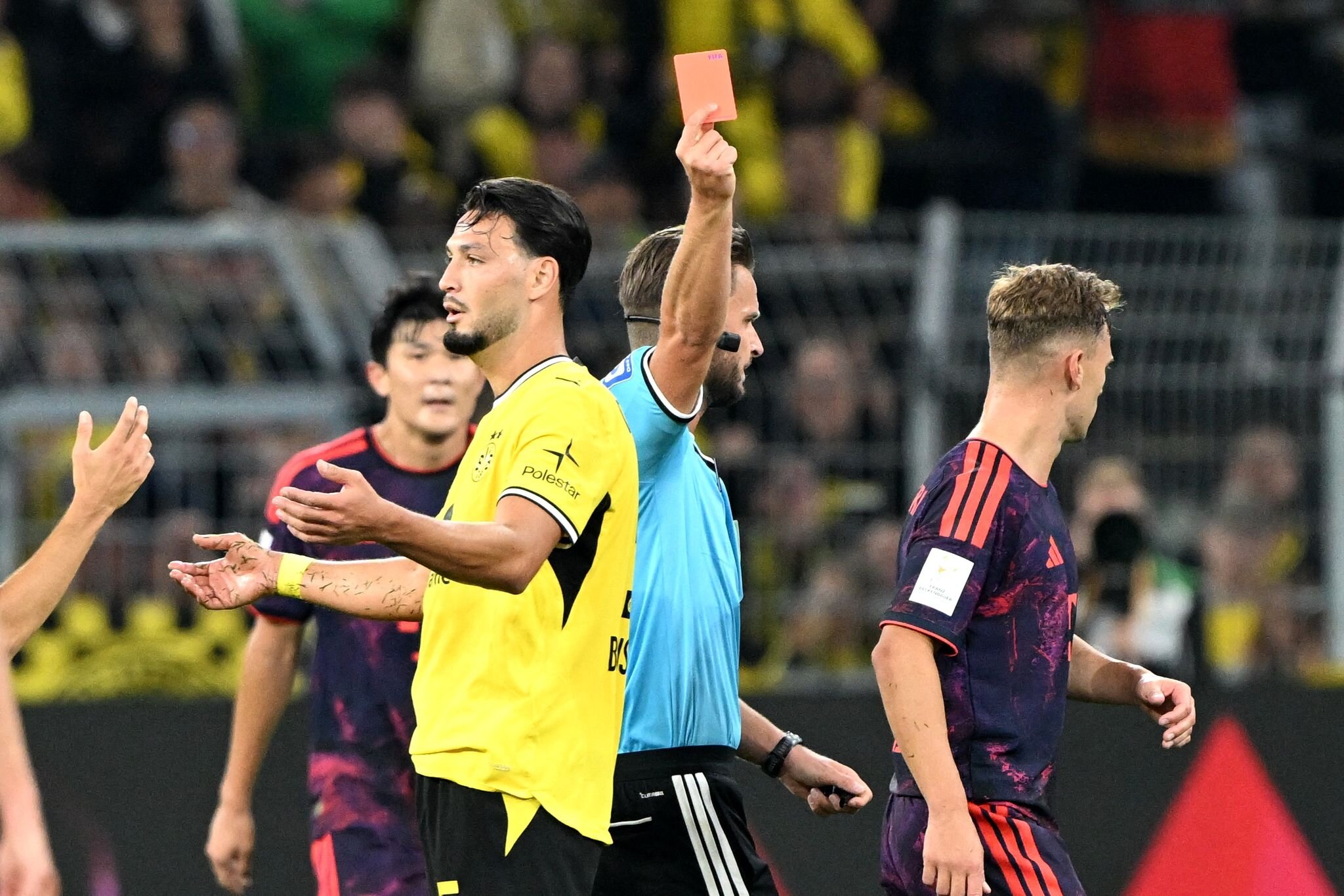 Dortmund defender Bensebaini suspended for two German Cup matches