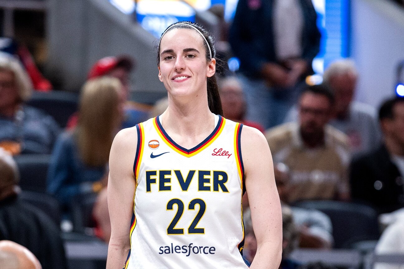 Caitlin Clark Sideline Interaction Creates Massive Social Media Debate