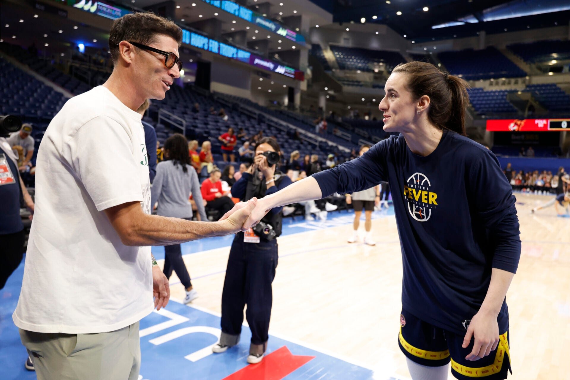 Caitlin Clark meets another elite scorer through pre-game meetup with Robert Lewandowski