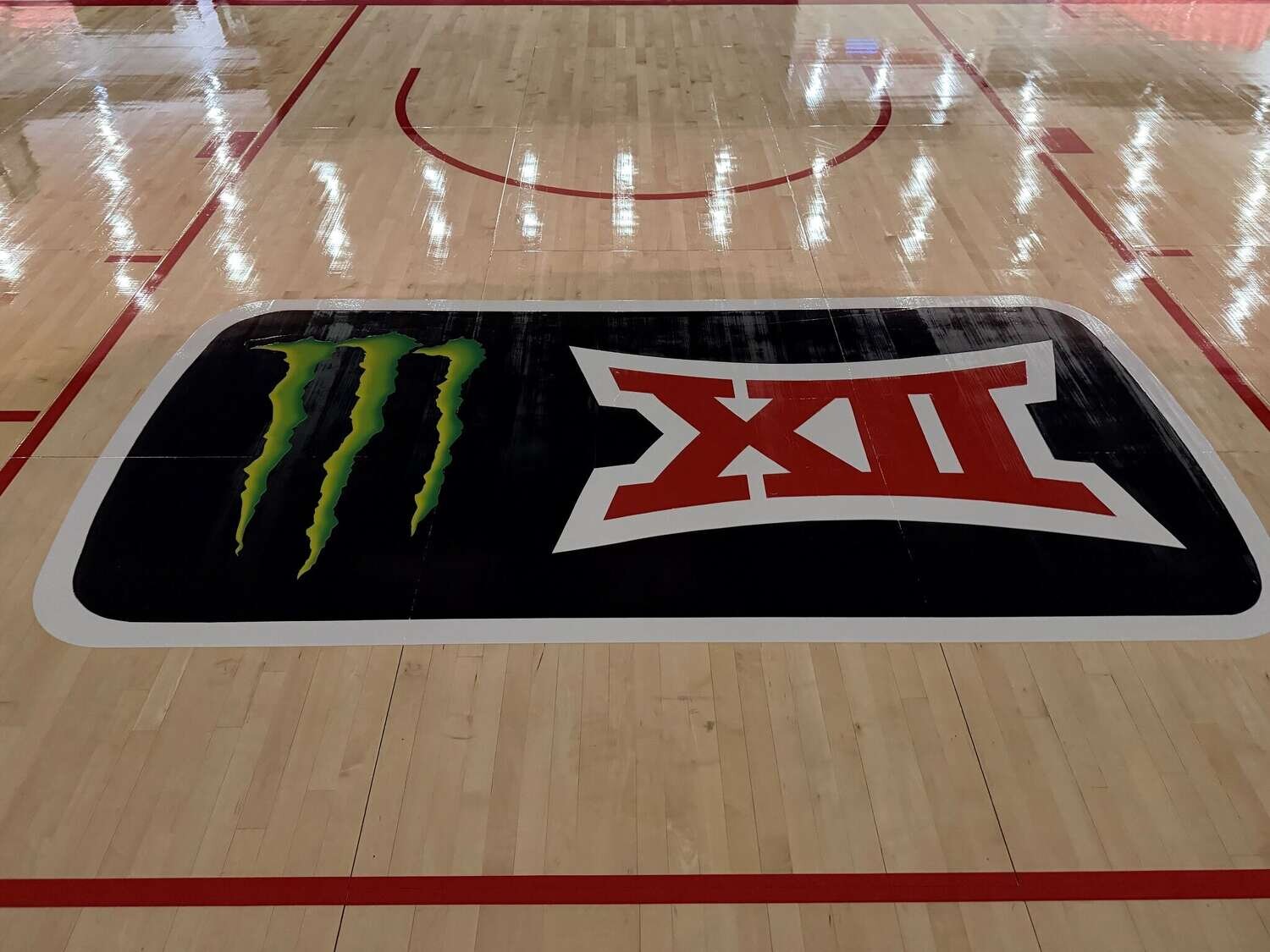 Fertitta Center adds a new logo on the floor for UH basketball as part Big 12 deal with Monster Energy