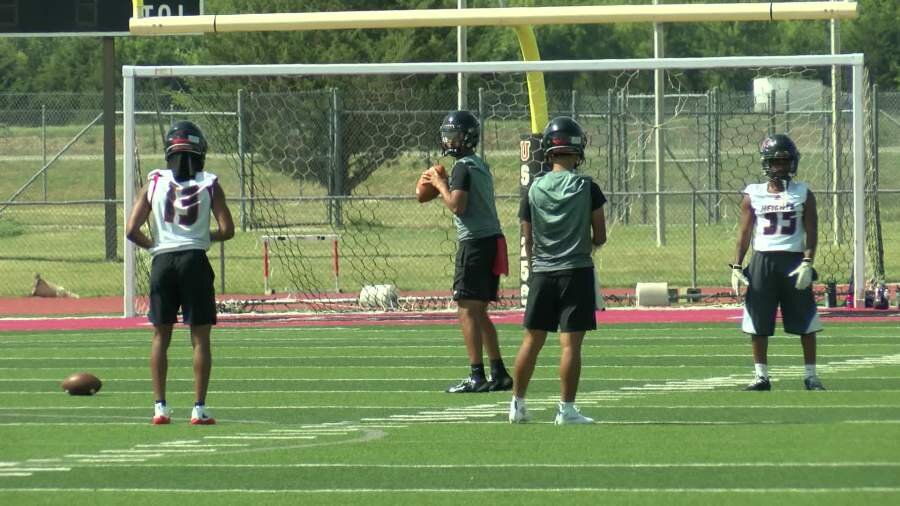 High school football teams find ways to safely practice in the Kansas heat