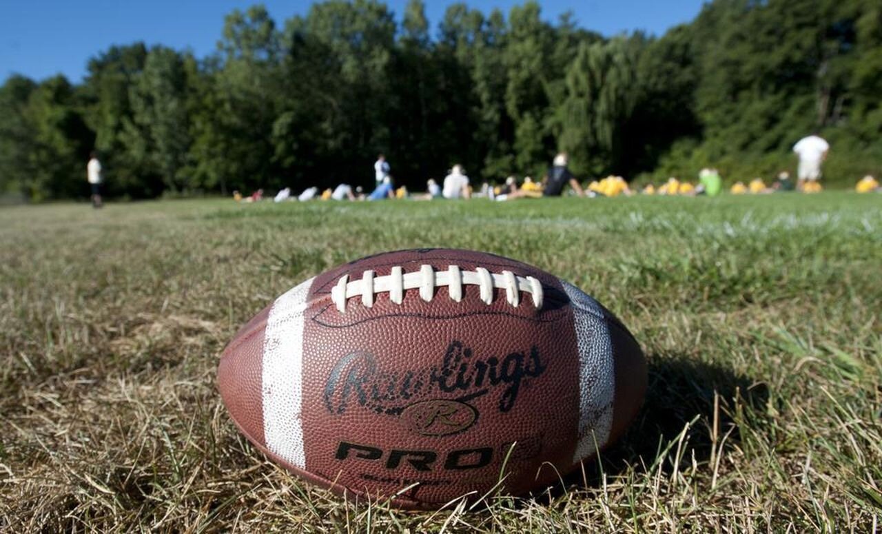 High school football player in Kansas dies after collapsing at first practice of the season