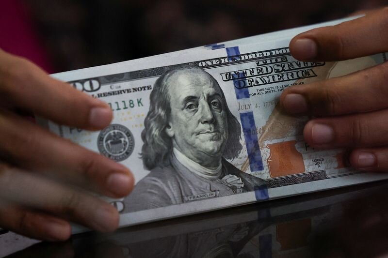 Dollar slips as in-line CPI tempers rate-hike bets