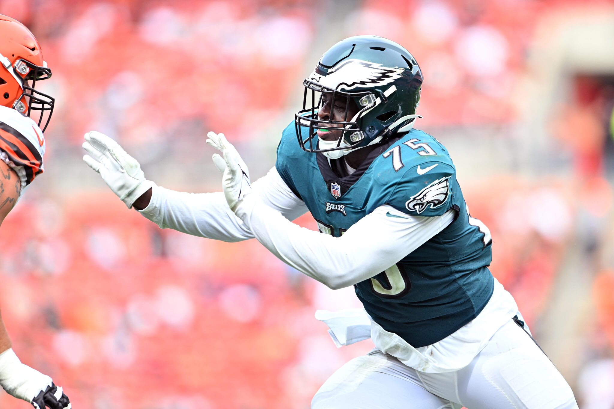 Eagles sign 3 players, including their former draft pick