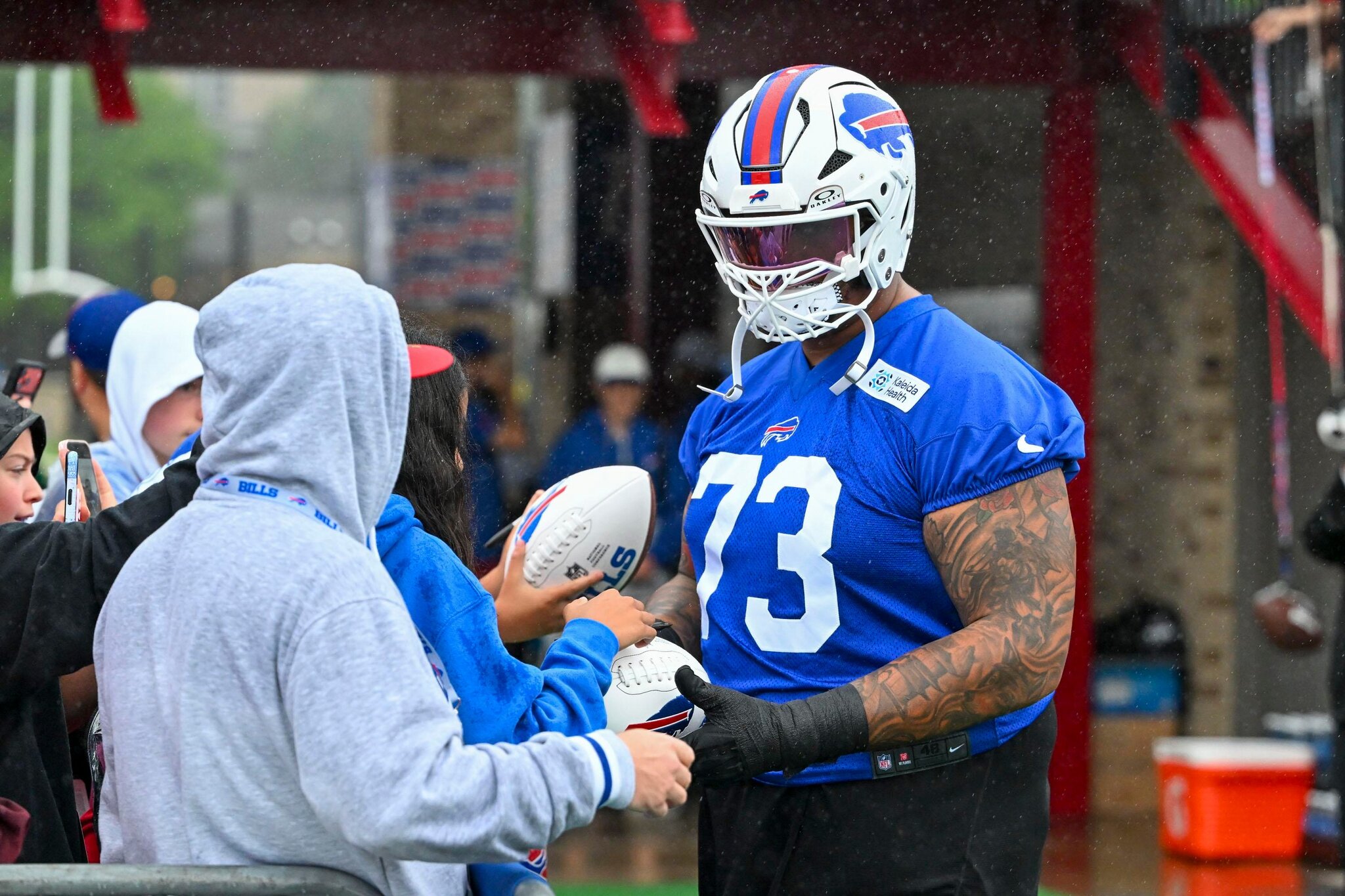 Why is Dion Dawkins fake panicking on some reps at training camp?