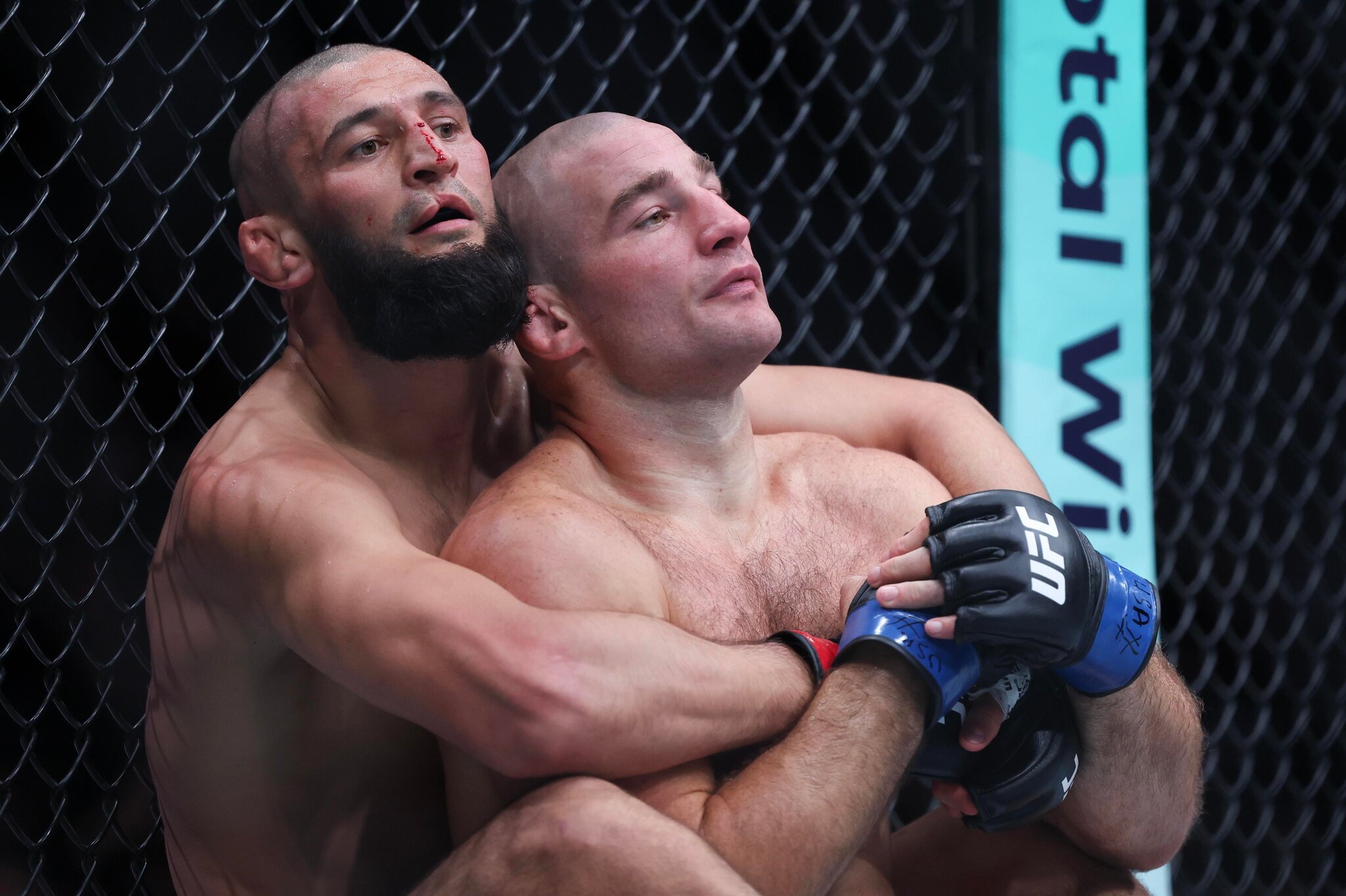 Sean Strickland and Khamzat Chimaev spoiled UFC ‘blood feud’ with bro hugs, handshakes