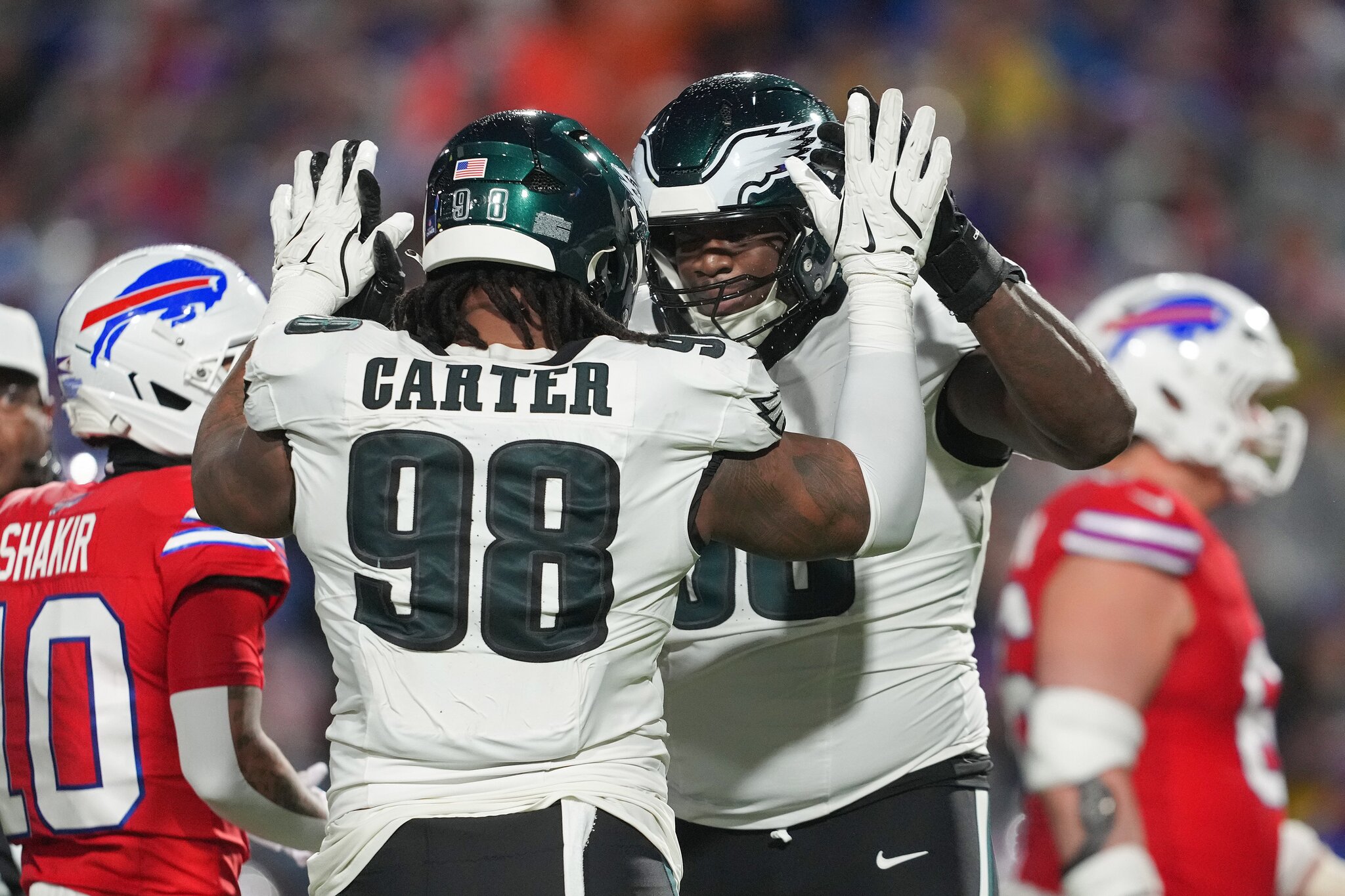Jalen Carter’s teammates celebrate his new contract