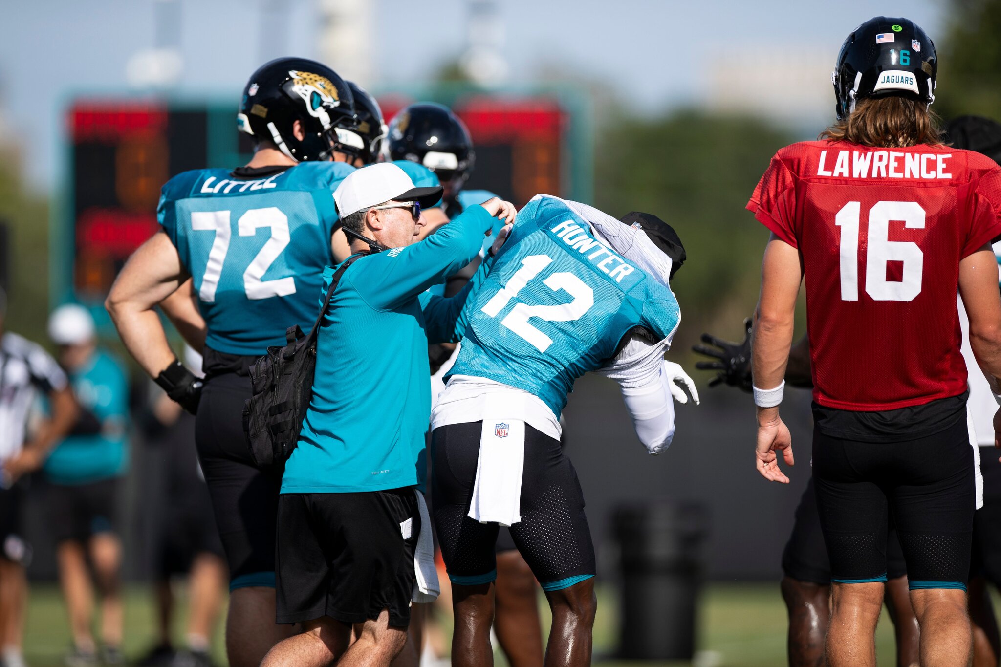 Jaguars Travis Hunter, equipment manager George Pellicer masters of the quick change