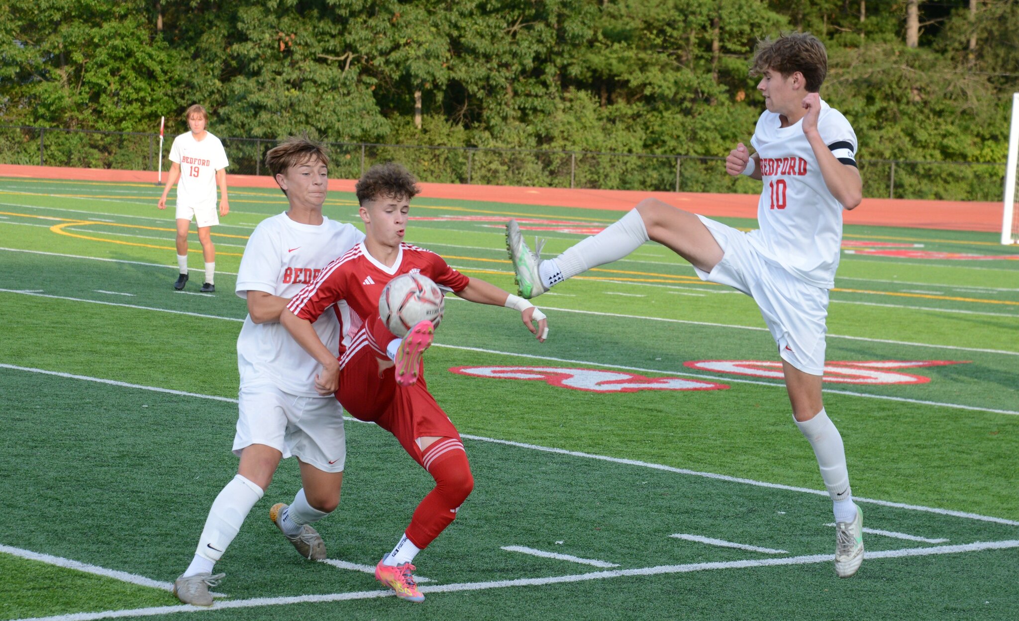 Bedford and Monroe play to tie in season opener