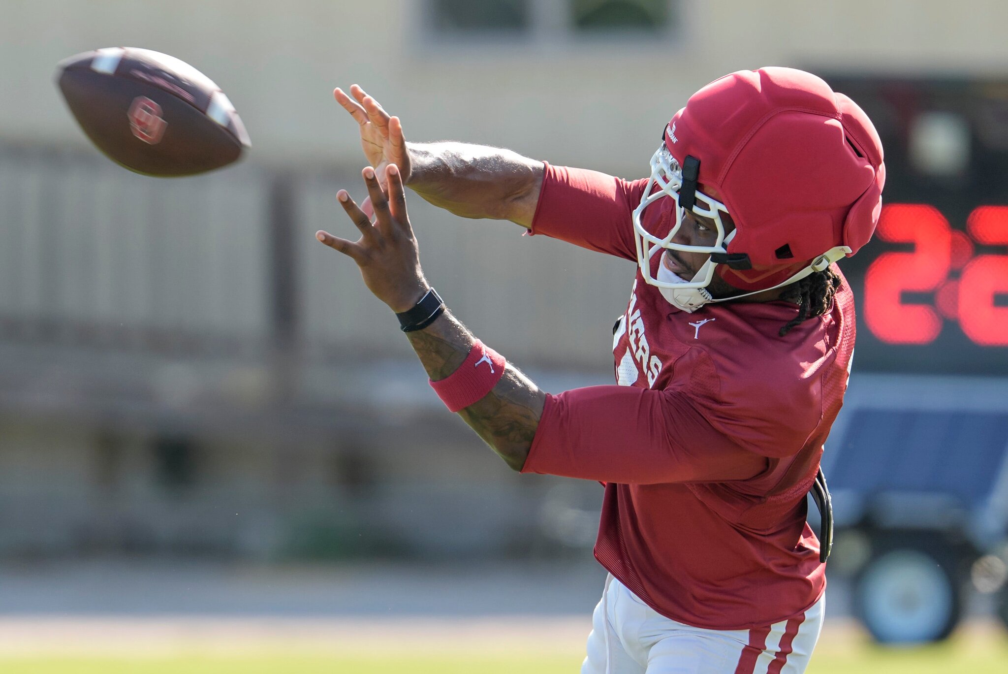 Trell Harris makes 'explosive' play after being limited in OU football camp