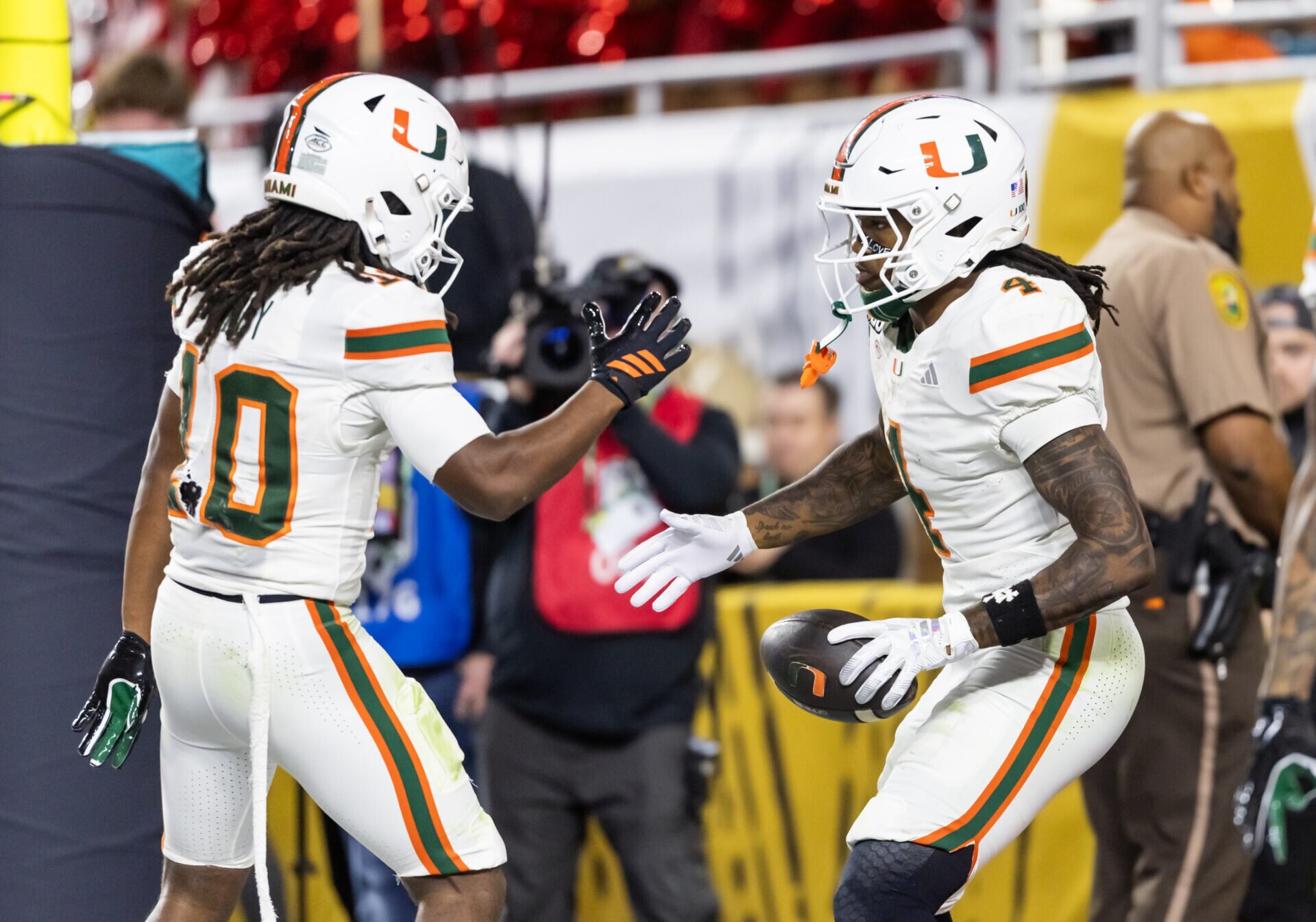 Michael Irvin presents mom of Miami football star Mark Fletcher Jr thoughtful gift for 2026 season
