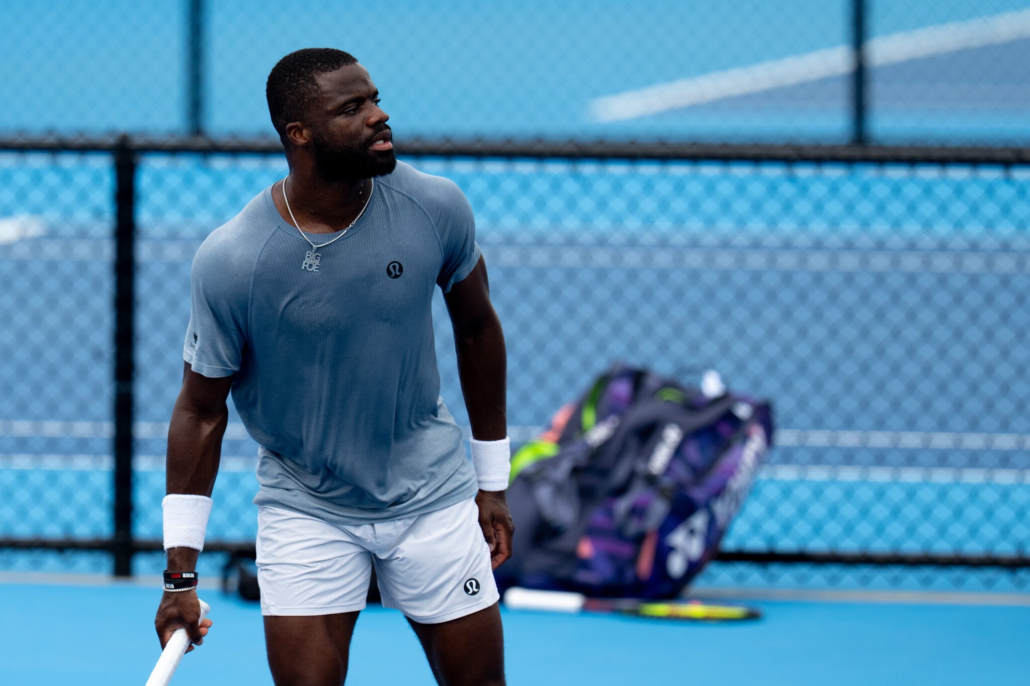 Learner Tien jokes to Francis Tiafoe, 'Your wrist is not injured, bro