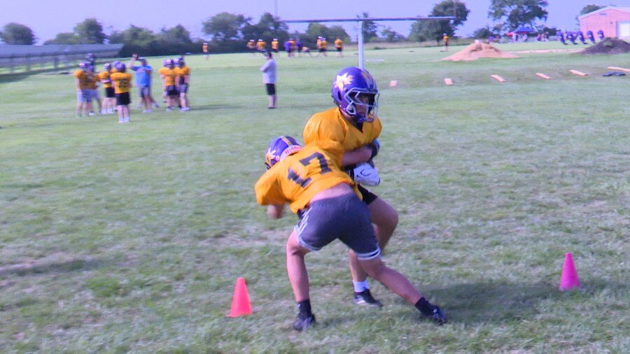 Boot Camp: Farmington seniors ready to lead young, hungry group