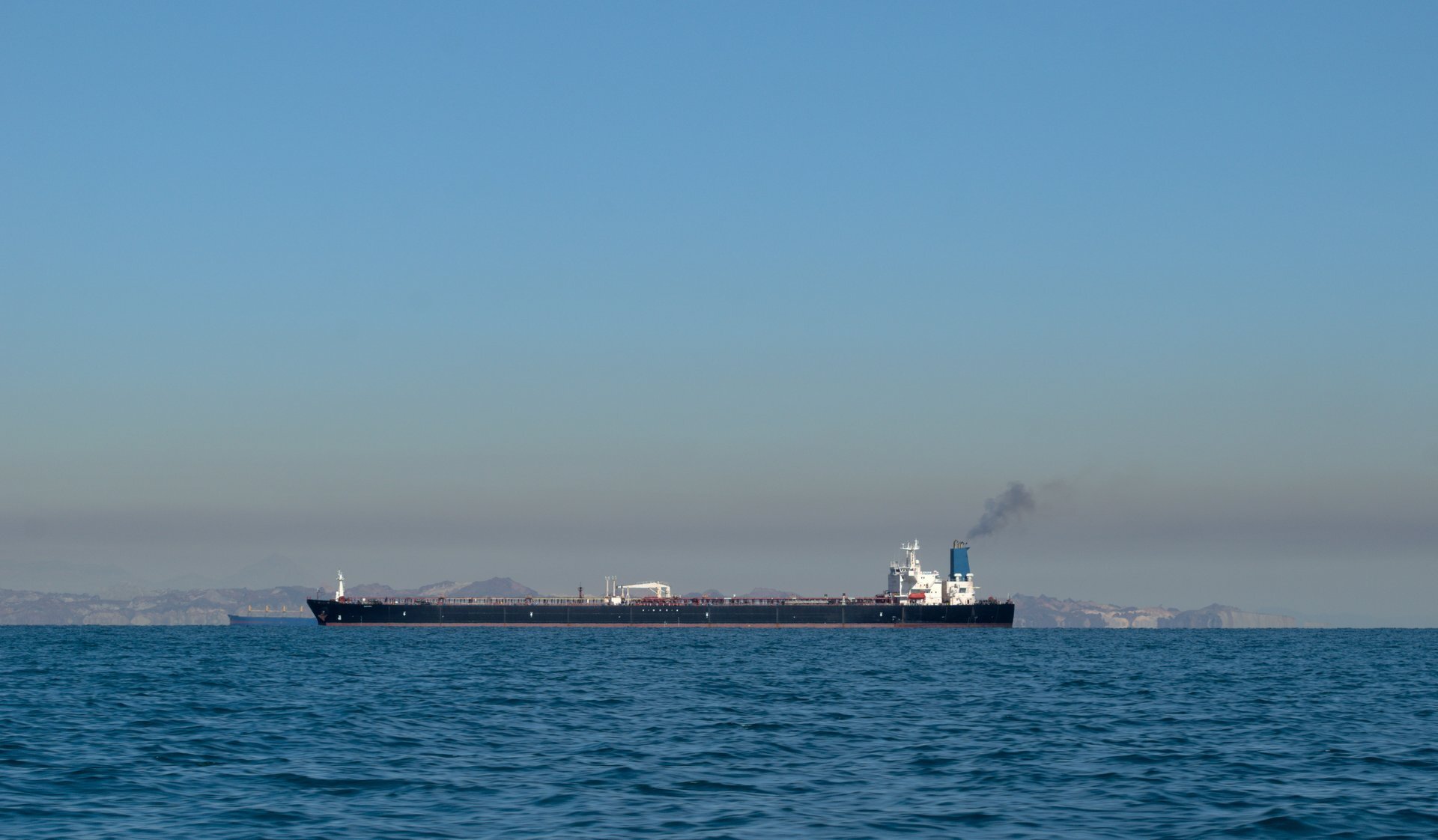Oil sinks to a one-week low as investors shrug off U.S.-Iran economic war