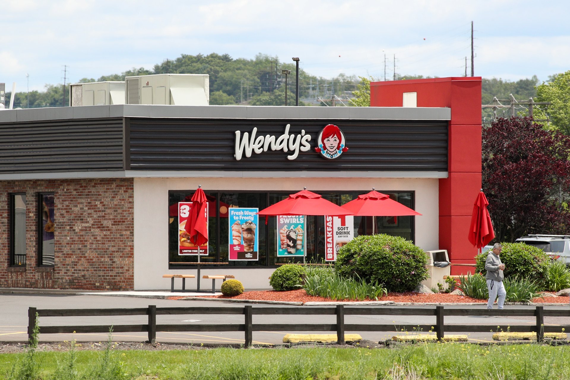 Wendy's is cutting its dividend and pulling its full-year forecast as its turnaround drags on