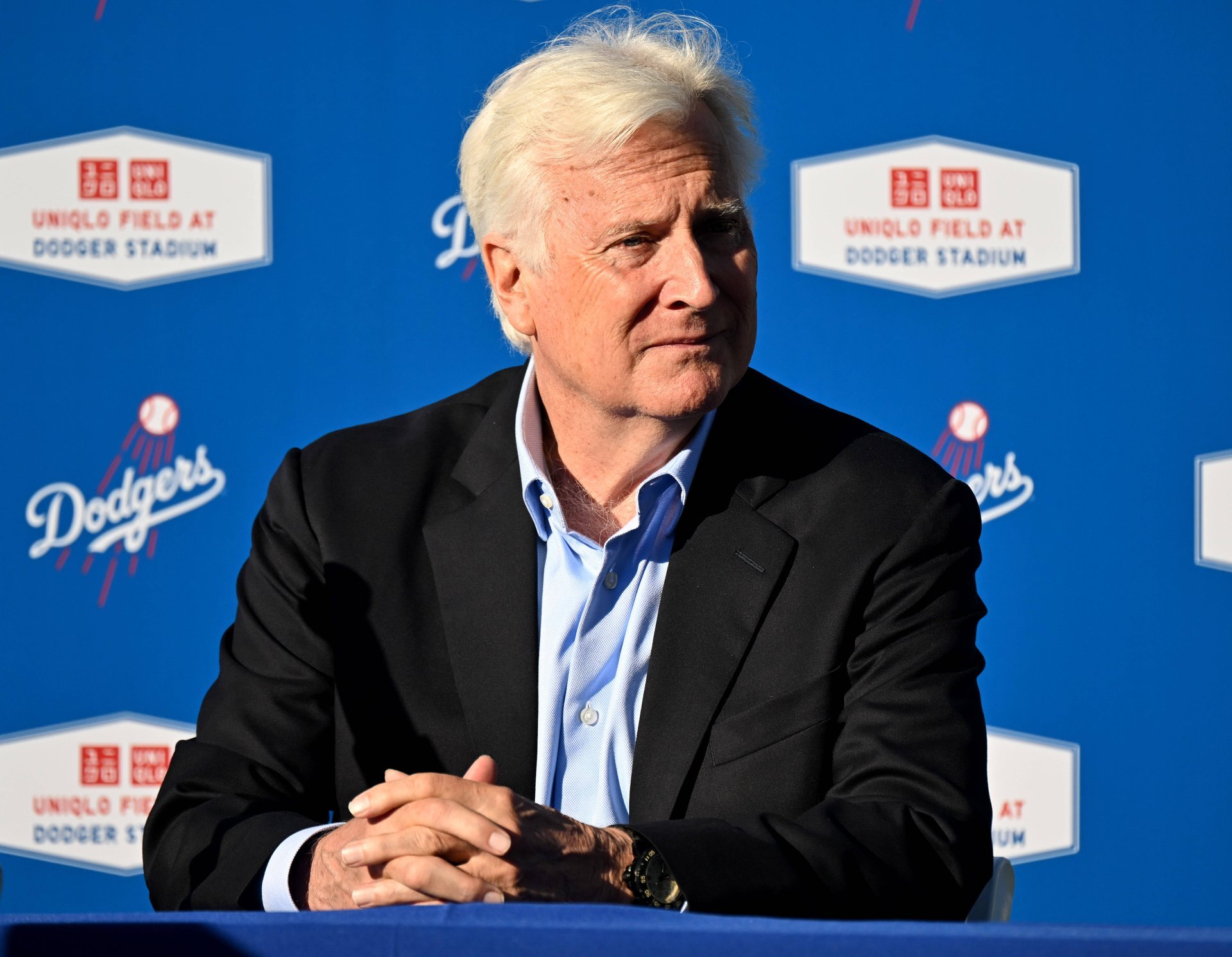 The Dodgers owner's insurer is slashing $6.5 billion in related-party loans after a federal probe
