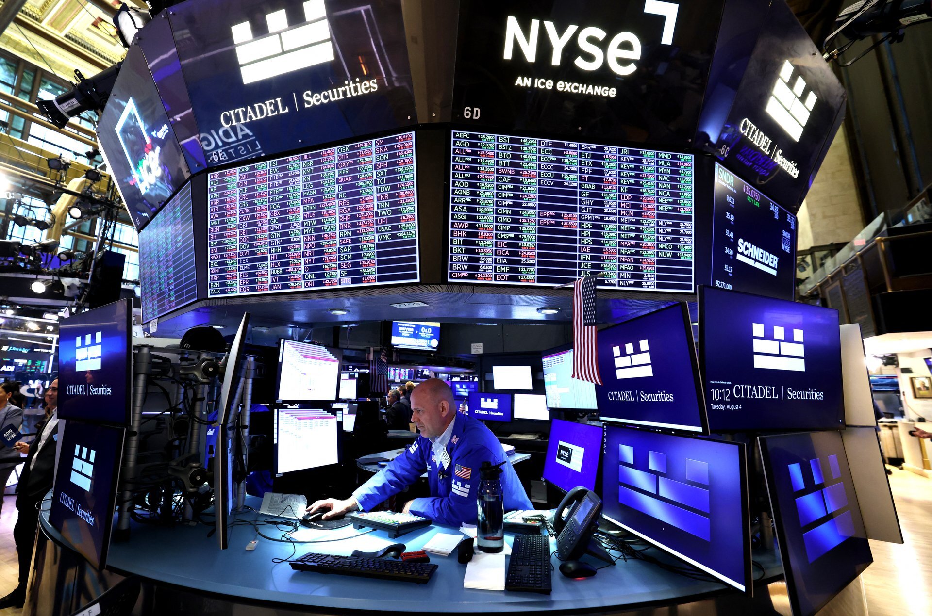 The Dow closed above 47,000 for the first time Tuesday, powered by earnings and falling oil