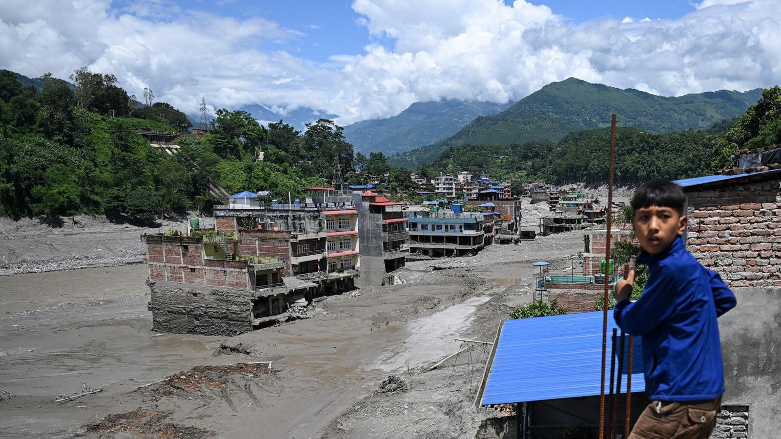 Hundreds dead as nearly 1,000 remain missing in massive Nepal-Tibet flood