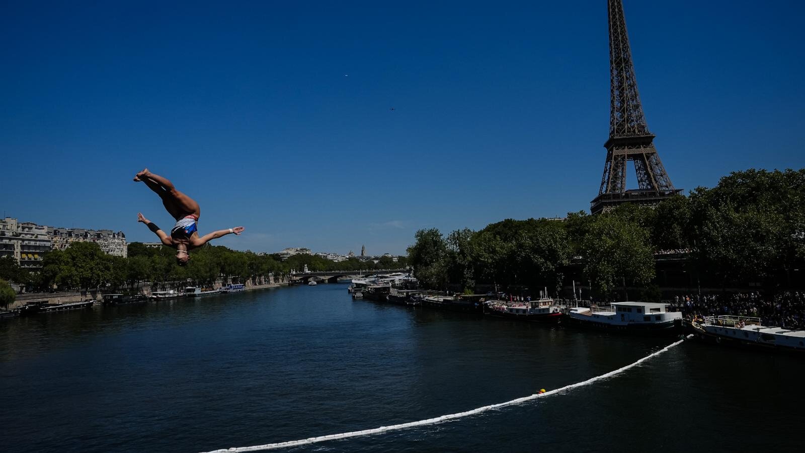 High divers take the plunge in the Seine in a new test of Paris’ reclaimed river