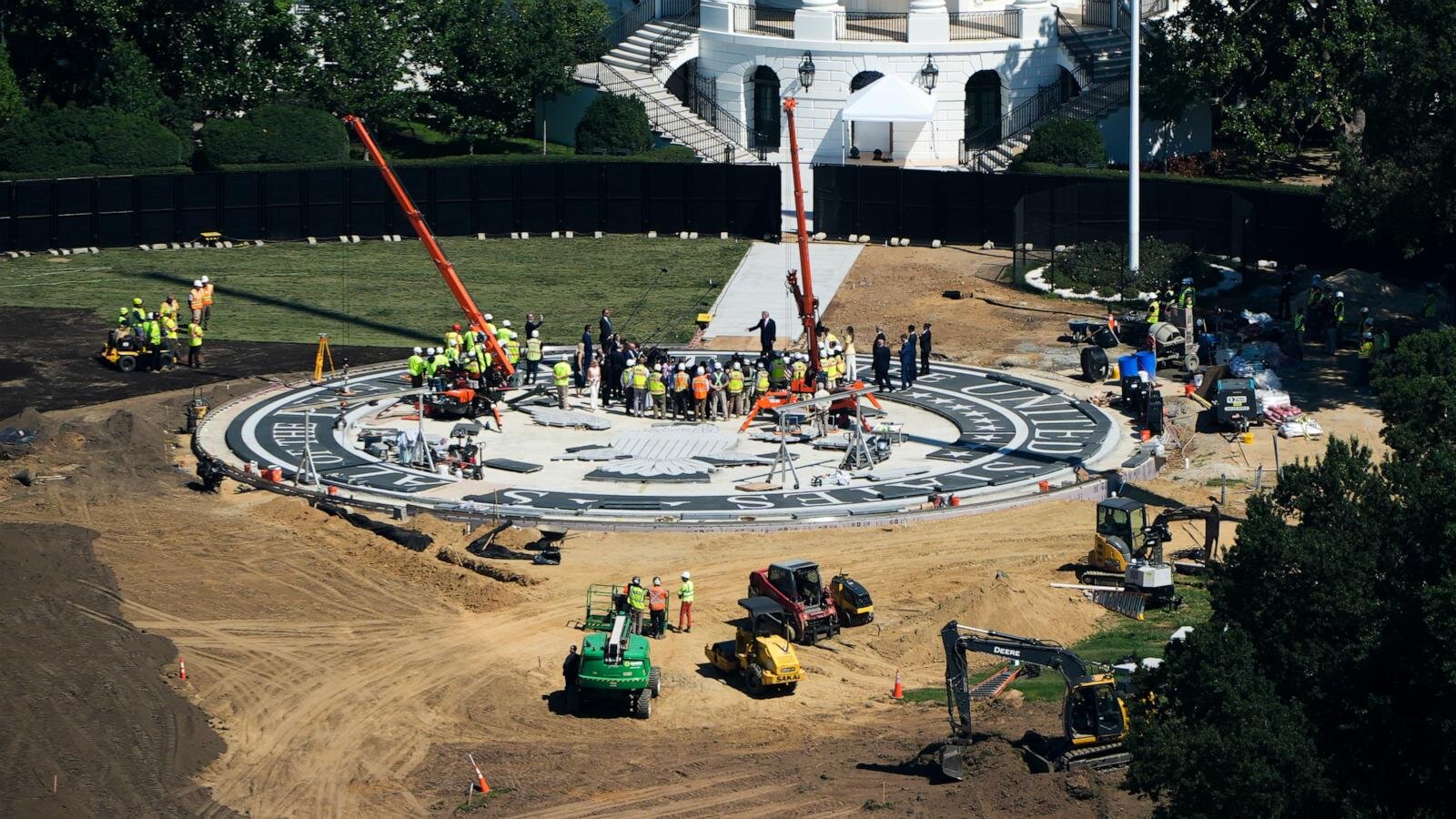 Trump plays White House tour guide to show off work on his helipad and ballroom