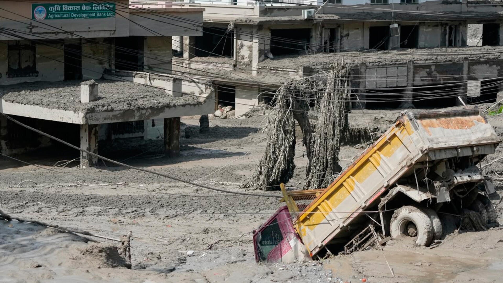 At least 22 bodies recovered, hundreds missing after Nepal-Tibet flash floods