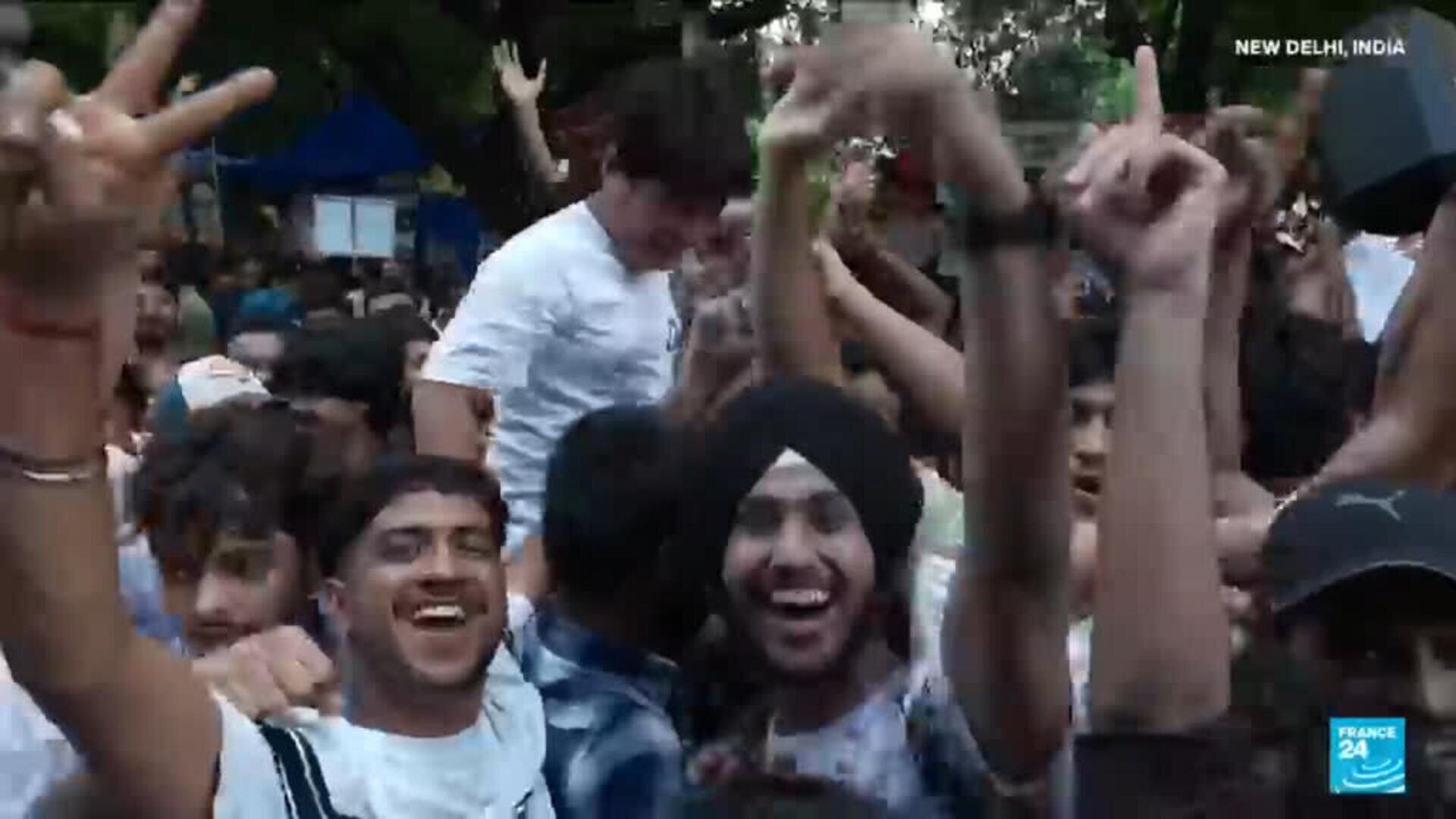 India protesters celebrate as education minister resigns, Modi announces exam system reform