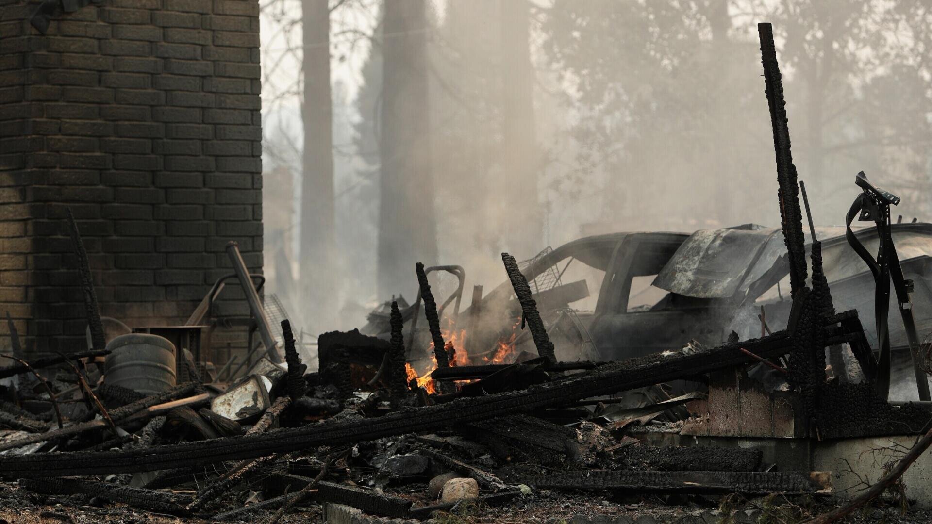Arson suspected in devastating US wildfire that forced 60,000 to evacuate