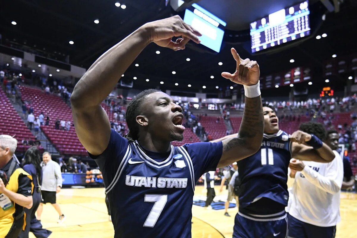 Utah State guard Kolby King announces Auburn basketball commitment